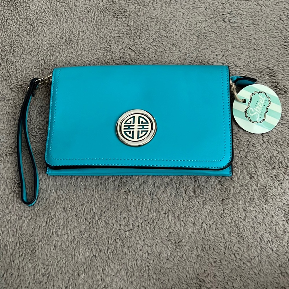 Never used turquoise clutch.